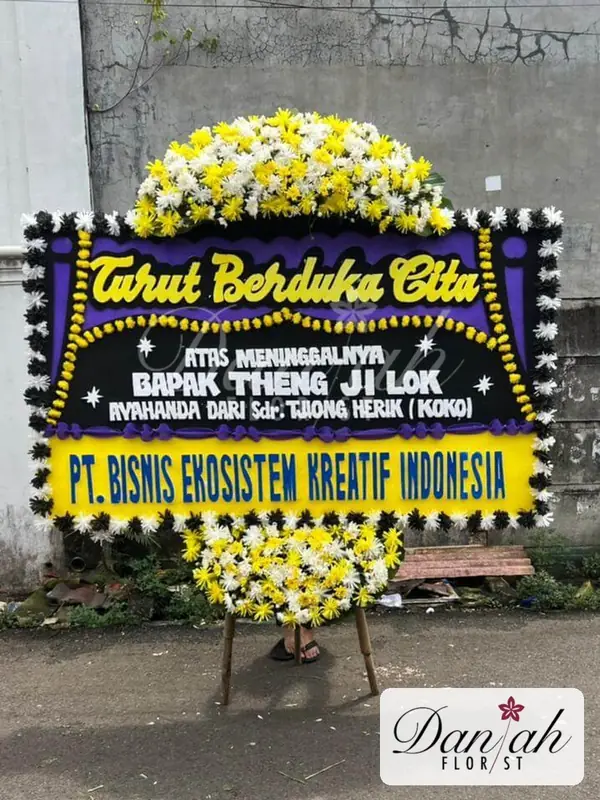 Bunga Papan Duka Cita Ungu Kuning DK-06 - Daniah Florist Jabodetabek dan Karawang