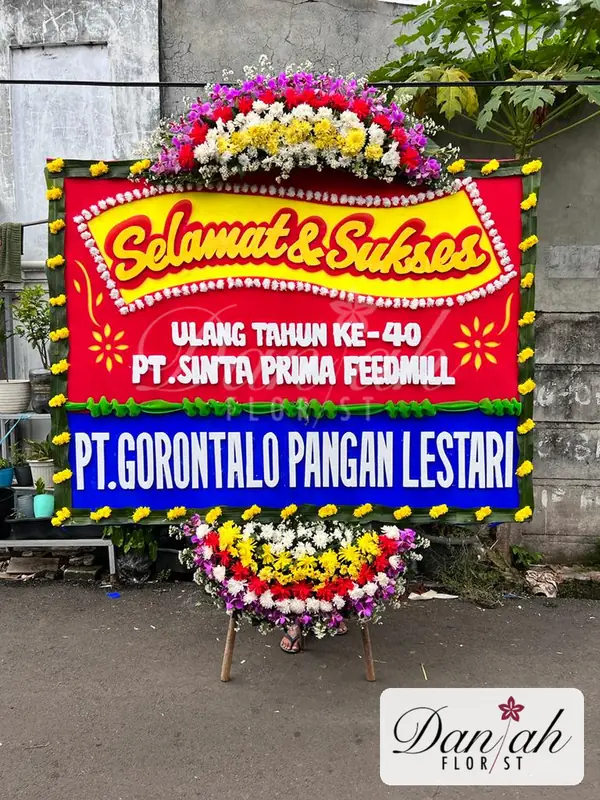 Bunga Papan Selamat Sukses Merah Kuning Panel Biru SS-09 - Daniah Florist Jabodetabek dan Karawang